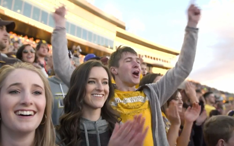 UW students cheering on football team in War Memorial