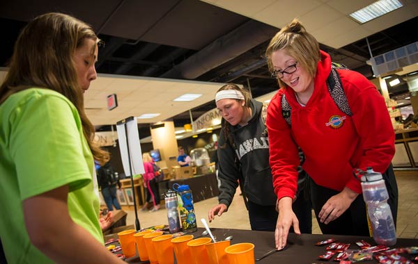 Female students inside union at table