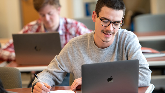 Students taking a test in class