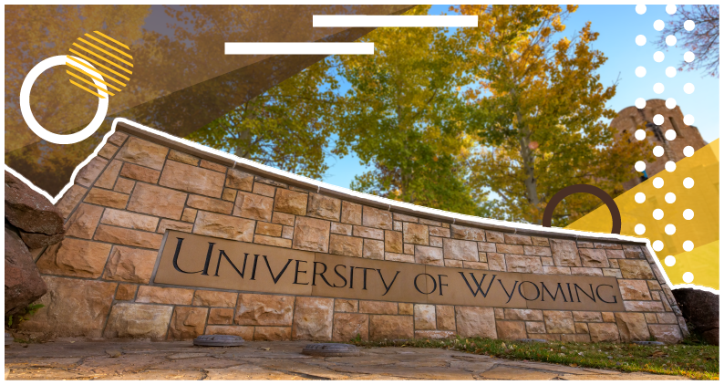 "University of Wyoming" sign in front of yellow trees