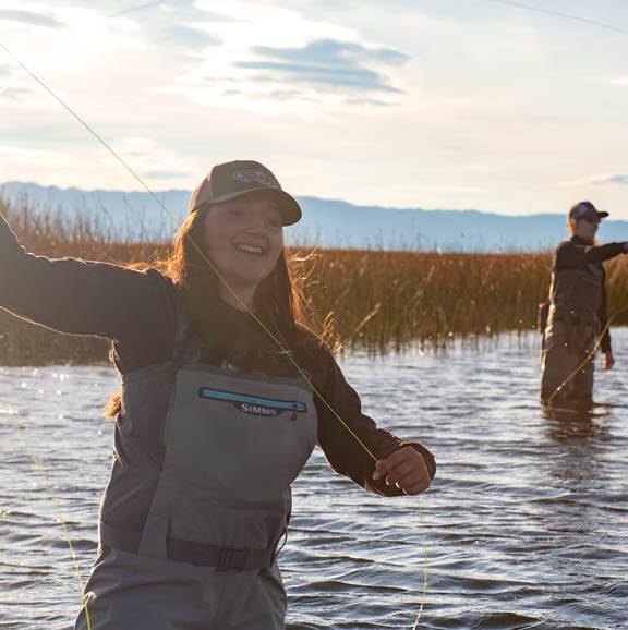 A student fly fishing.