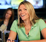 College student sitting in class looking towards instructor.