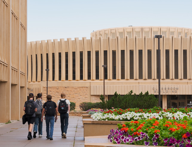 students outside the Classroom Building 