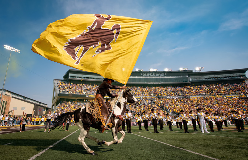 war paint the horse leads the cowboys onto the feild 
