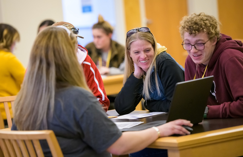 student works with an advisor