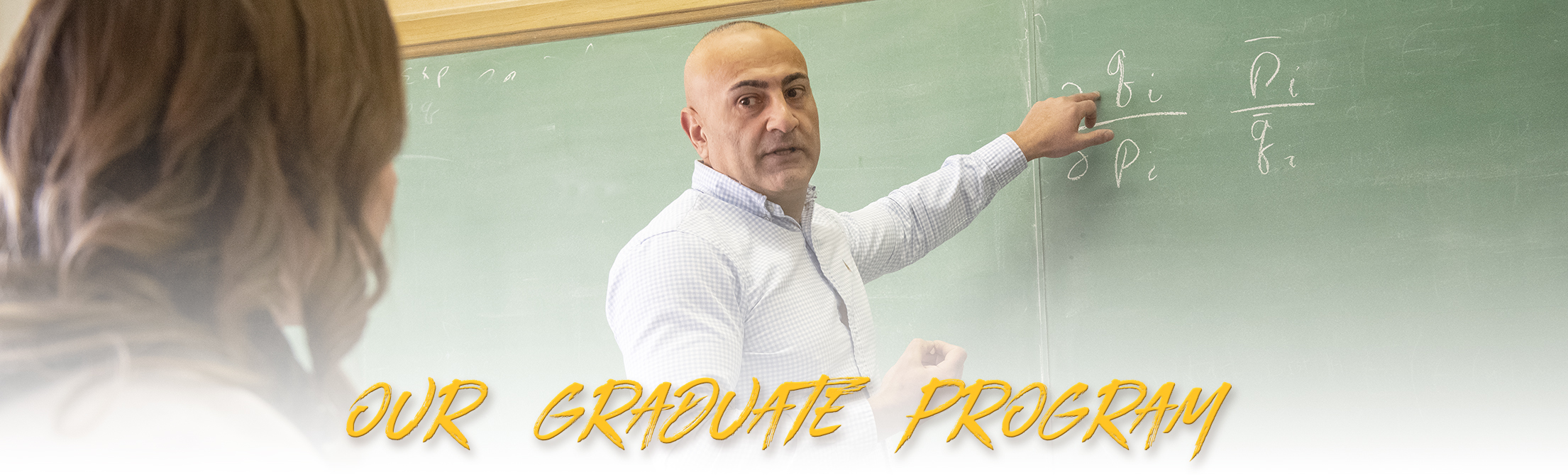 Vardges Hovannisyan teaches an Ag Econ masters student with text that says "our graduate programs"