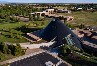 An aerial shot shows the American Heritage Center and surrounding University of Wyoming campus.
