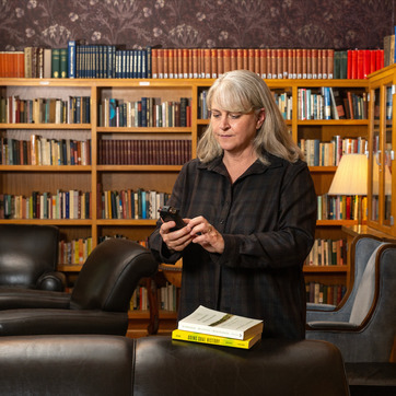 An archivist works in a library