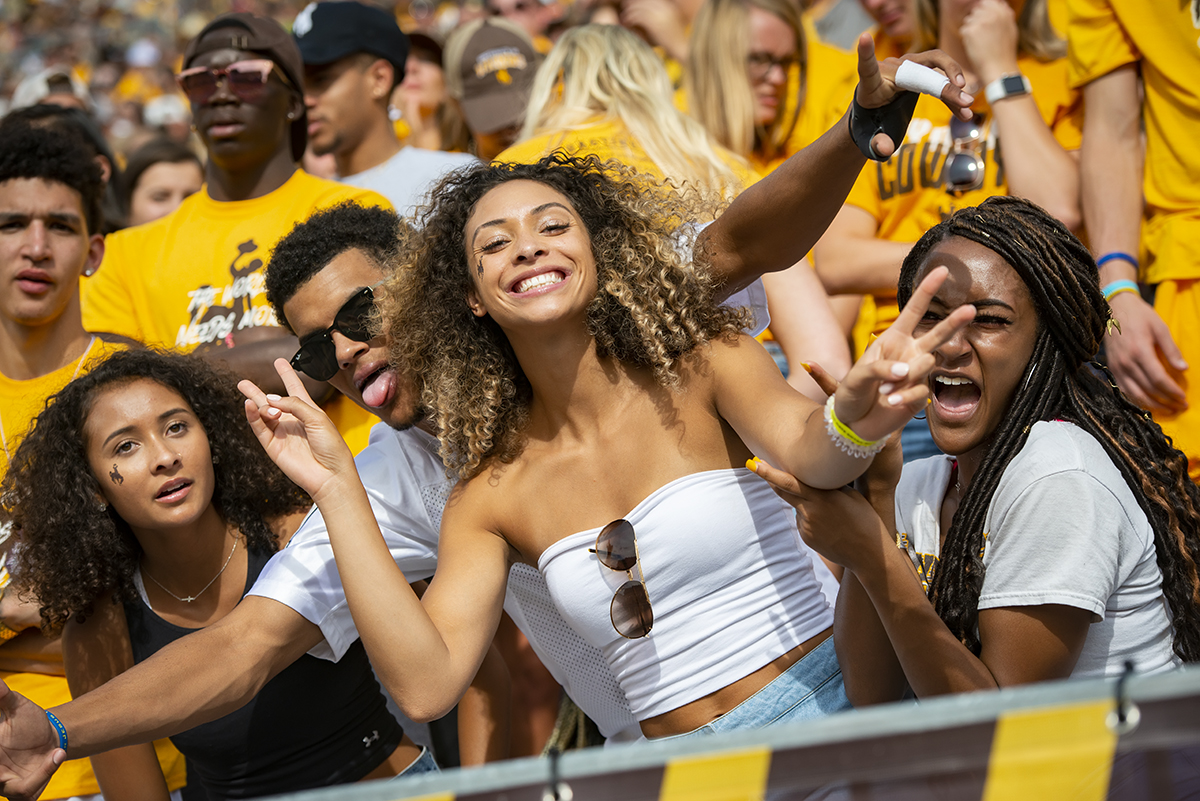 UW Students cheering at football game