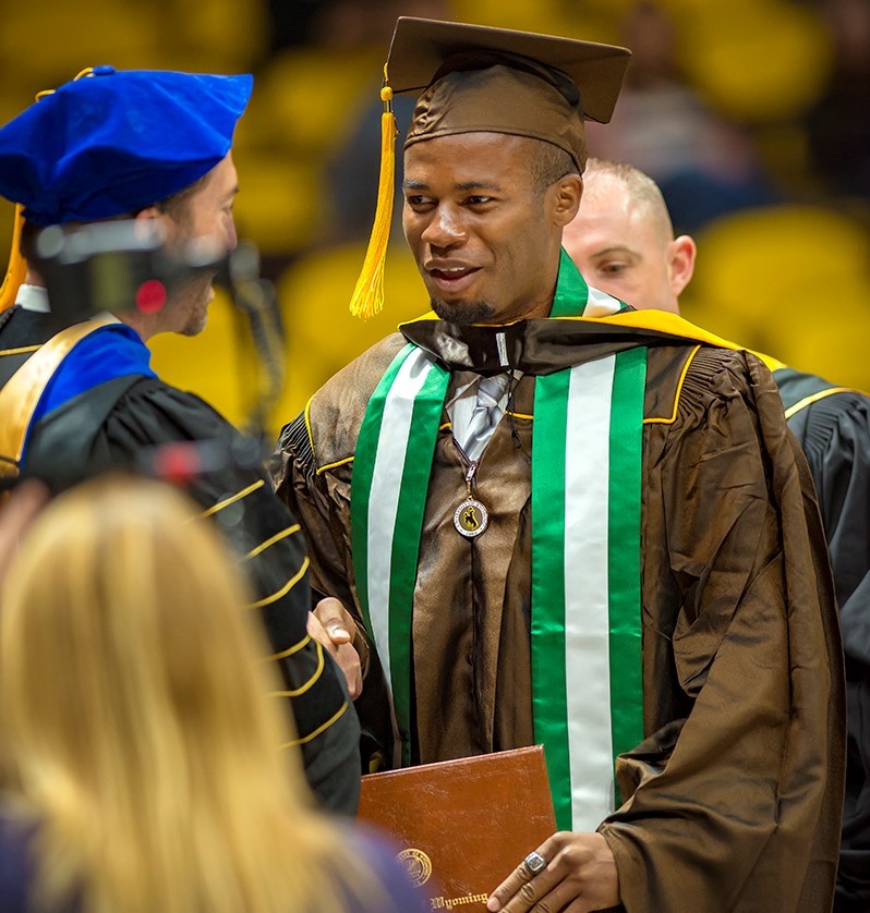 UW graduate at graduation