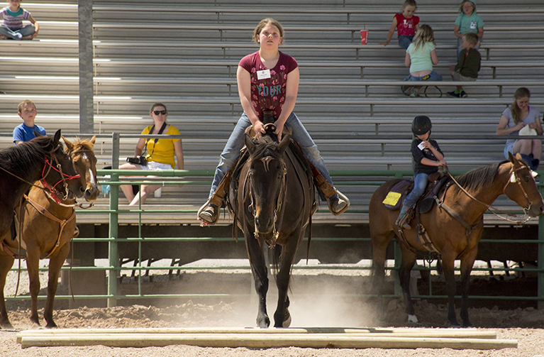 Girl riding horse
