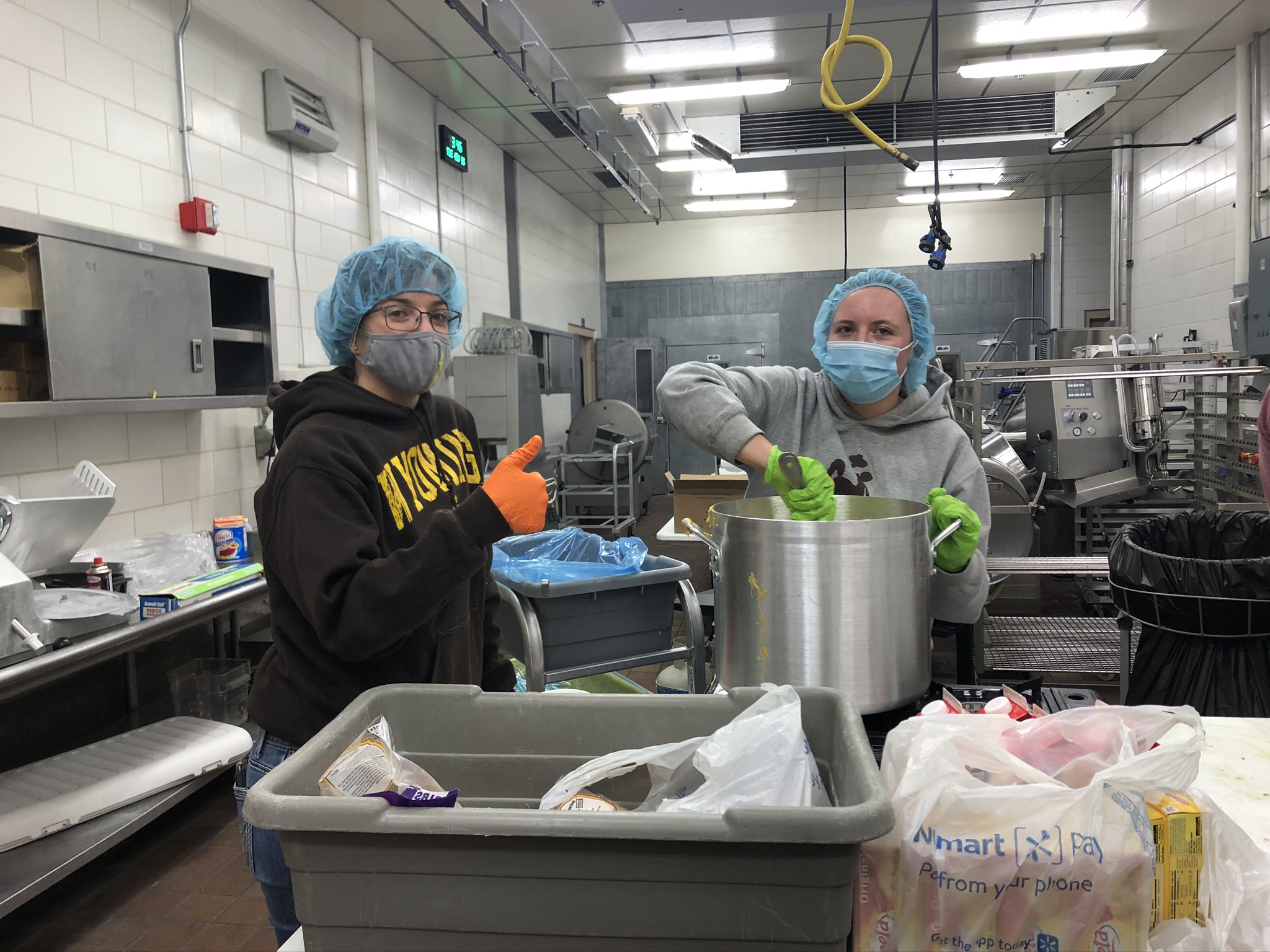 Members of the UW Food Science club prepare food for one of the club's takeout nights. 