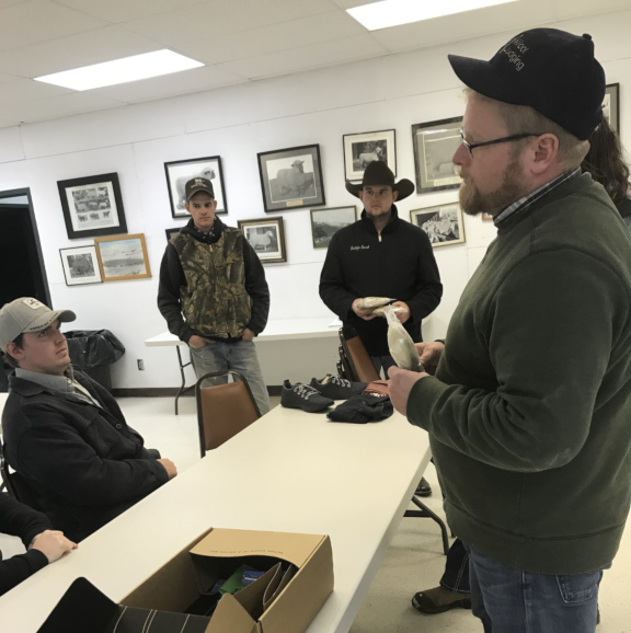 Dr. Whit Stewart explaining the versatile use of wool. 