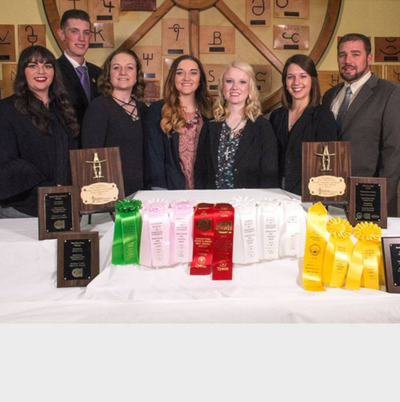 The 2018 University of Wyoming Meat Judging team with their year-long earnings of awards. 