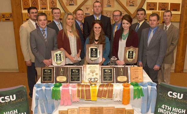 2017 UW Judging Team poses with the awards it won throughout the season.