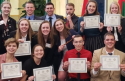 model Arab league students holding certificates