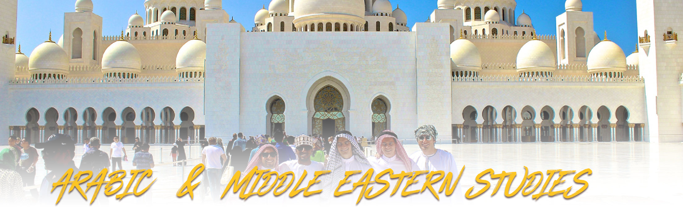 Arabic Language student Zane Rowland standing with 4 friends in front of the Grand Mosque