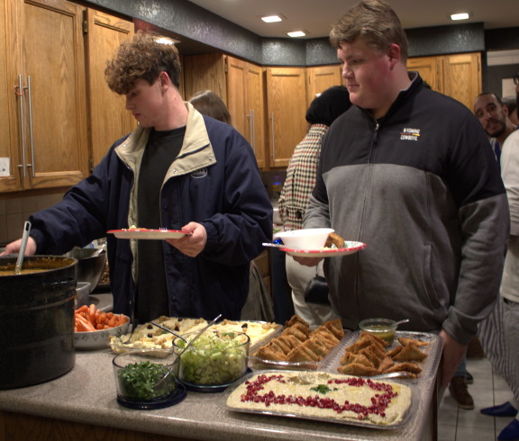 two UW students eating at the MENA cultural club