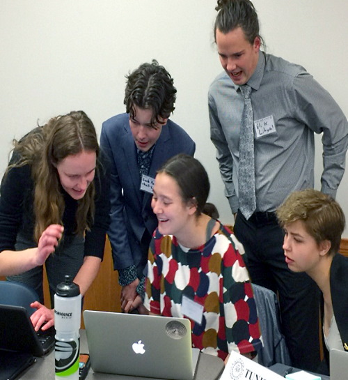 students collaborating during a model Arab league competition