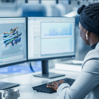 female user using software at a computer