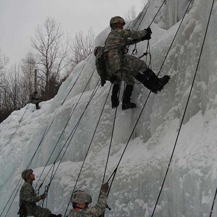 Army ROTC mountain warfare training repeling from frozen waterfall