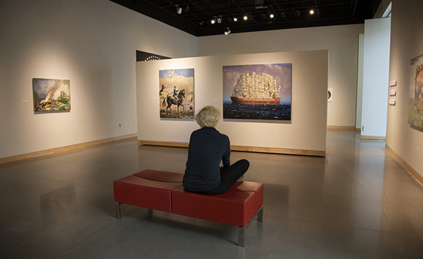 Student viewing an exhibition