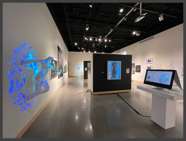 Art gallery with portraits and 3-D digital art projected on wall