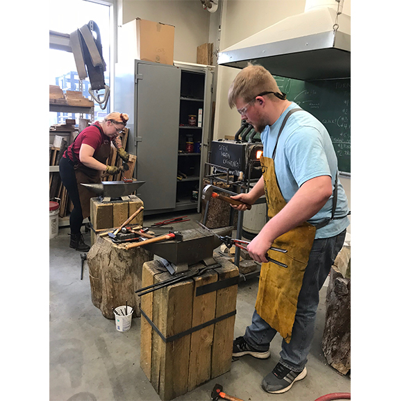 Students welding 