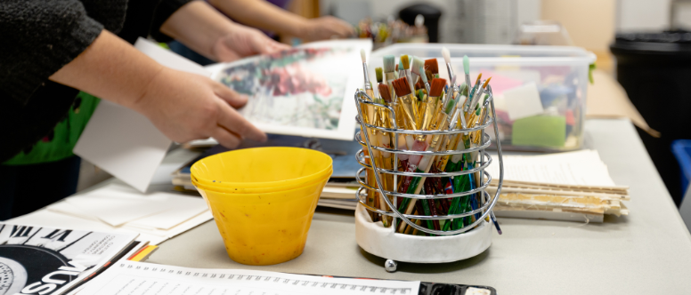Image of hands working on an activity