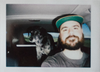 Fred Hirschman and dog in car