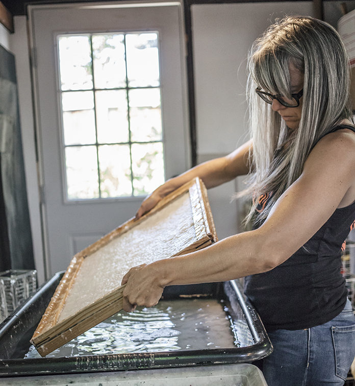 enene Nagy working in her studio