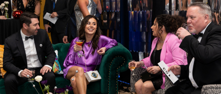 group of people conversing at an event