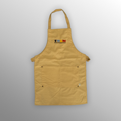 Tan Artist's Apron with embroidered “UWAM” logo and adjustable neck strap
