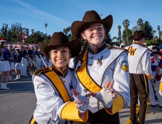 Two Western Thunder Band Members smile during the 2025 Rose Parade.