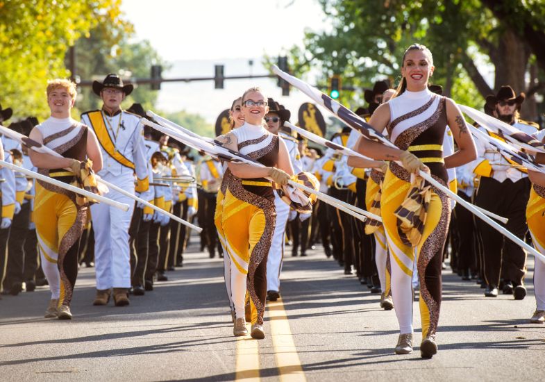 The Western Thunder Marching Band marches in the homecoming parade.