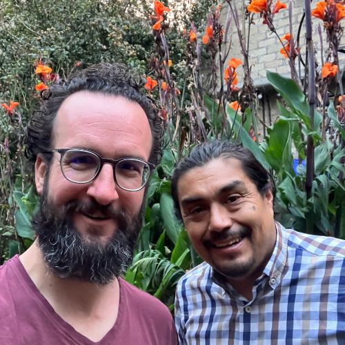 Nic Crane smiles with one of his collaborators during a recent trip to Mexico