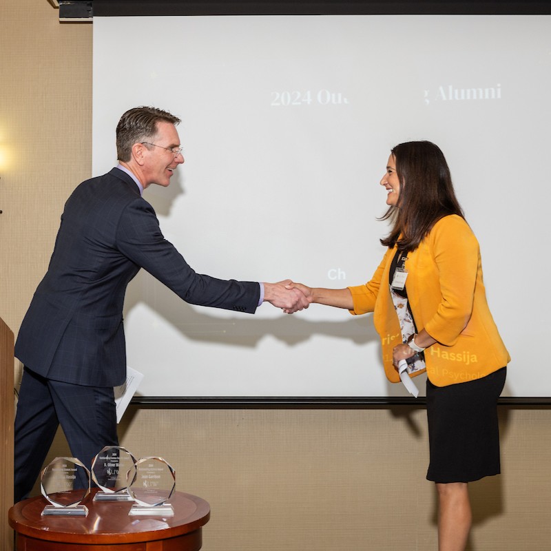 Christina Hassija wins the 2023 outstanding alumni award.