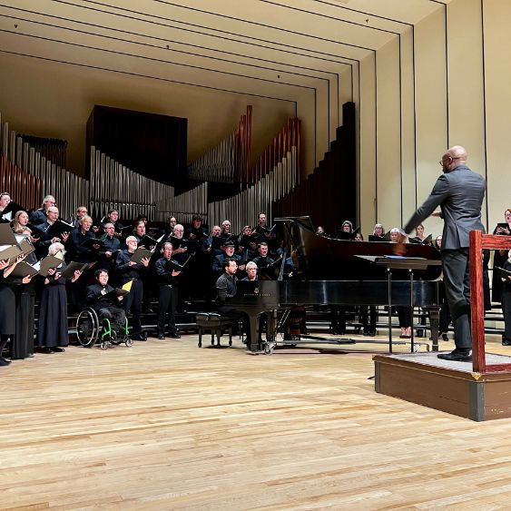 O'Neil Jones conducts a choir