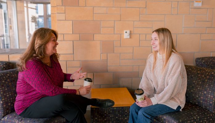 Admissions Director Shelley Dodd talks with a student.
