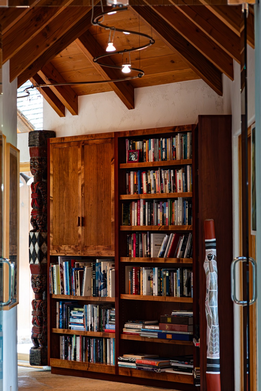 bookshelf in a long hallway