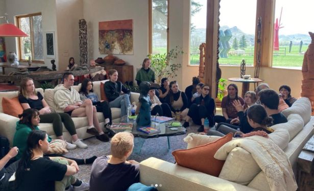 A large group gathers during a past mini-residency.