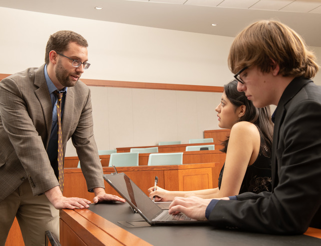 Students meeting with an attorney