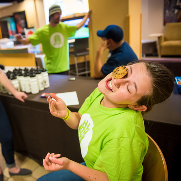 Student playing a game with cookie