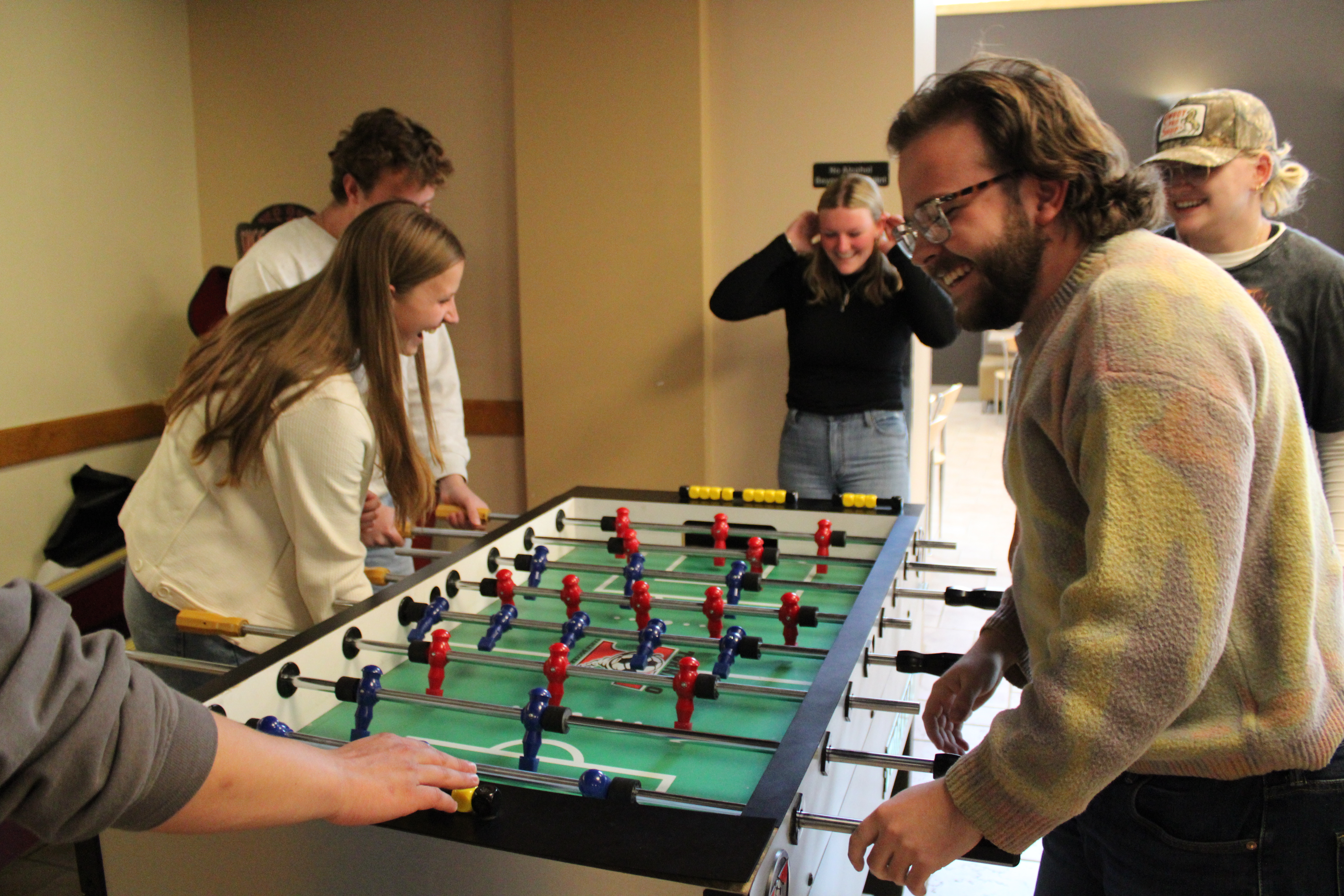 Students play foosball in the Union gameroom