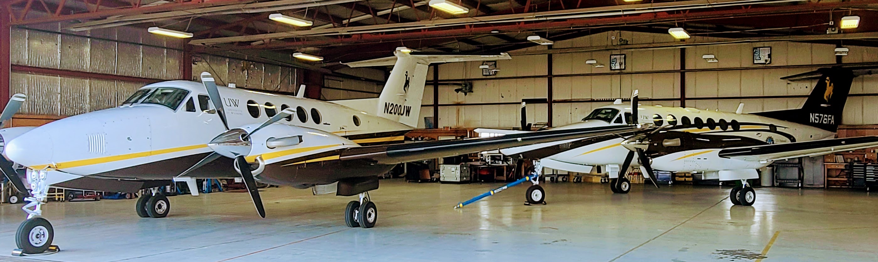 two aircraft in a hangar