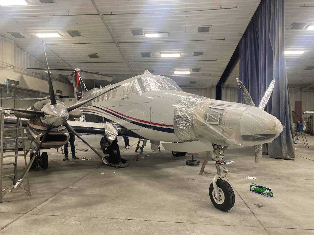 The aircraft being prepared for paint removal