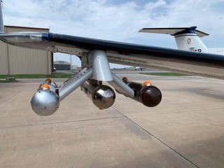 PMS-style canisters mounted on wing pylons