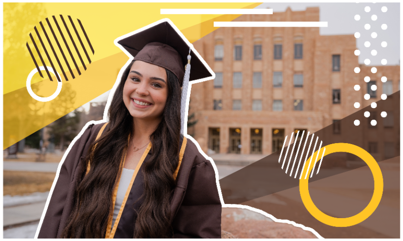 Audrey wearing her graduation cap posing on campus.