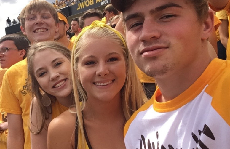 Shelbey and her friends smile in group photo