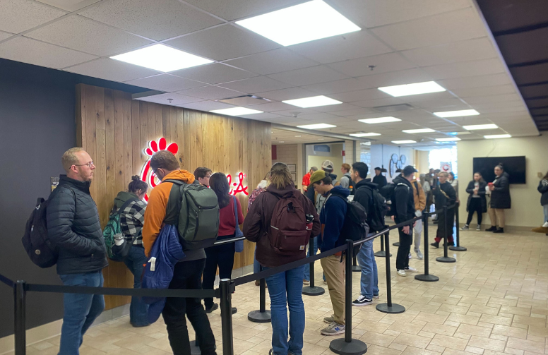 students wait to order Chick-fil-a in the Union 